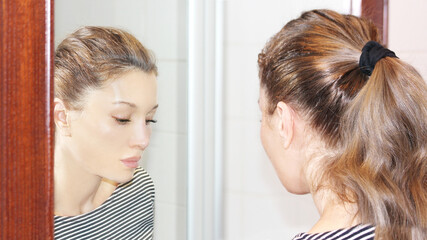 Magic anti-aging cream.Applying the cream.