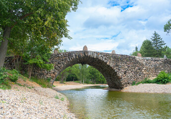 The old stone bridge over the pond
