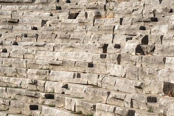 old stone tribunes of ruined ancient amphitheate in Myra, Turkey