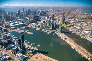 Fototapeta na wymiar MELBOURNE, AUSTRALIA - SEPTEMBER 8, 2018: Aerial city skyline from helicopter. Downtown and Yarra river.