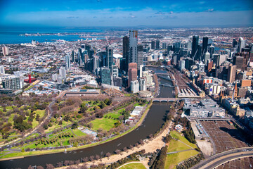 MELBOURNE, AUSTRALIA - SEPTEMBER 8, 2018: Aerial view of city central business district and Yarra River from helicopter.