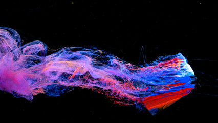 Ink in water isolated on Black background.