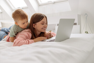 Child interested looking at the laptop screen