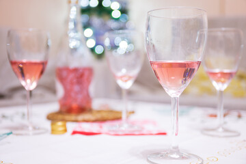 Glasses with rose wine after celebration and toast