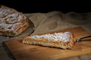 Pantxineta, puff pastry cake with pastry cream decorated with almonds and icing sugar, traditional Basque Country dessert