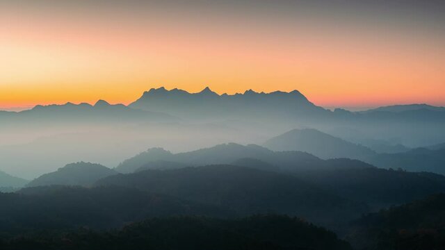 Sunrise over Doi Luang Chiang Dao mountain and foggy on hill in national park from Doi Kham Fah viewpoint at Chiang Dao