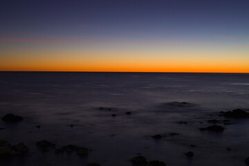 Obraz premium Beautiful sunset at the Pacific Ocean