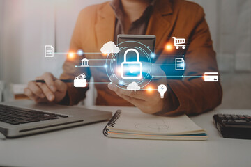 Cybersecurity and privacy concepts to protect data. Lock icon and internet network security technology. Businessman protecting personal data on smart phone with virtual screen interfaces.