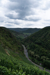 Fototapeta na wymiar Germany, Rhineland-Palatinate, Altenahr, Ahr Valley, country road before the floods and highwater in 2021 with dark clouds
