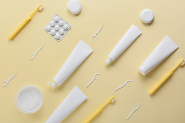 Set of dental hygiene on beige background