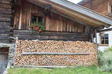 firewood in front of a house