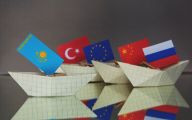 Fototapeta na wymiar ships with flags of Kazakhstan surrounded by Russia, China, Turkey and the European Union EU