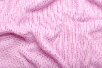 Fototapeta na wymiar Knitted crumpled fabric as background
