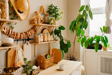 kitchen is made of wood with elements of eco style. hat and bagels