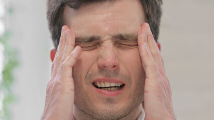 Face Close Up of Man Having Headache