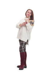 attractive casual woman with a gift box .isolated on a white background.
