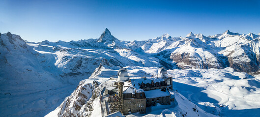 Gornergrat, Switzerland - January 06. 2022: Aerial panorama image of the Gornergrat with the famous...