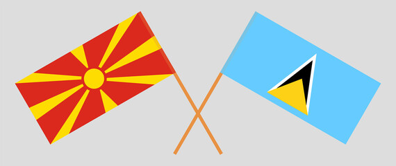 Crossed flags of North Macedonia and Saint Lucia. Official colors. Correct proportion