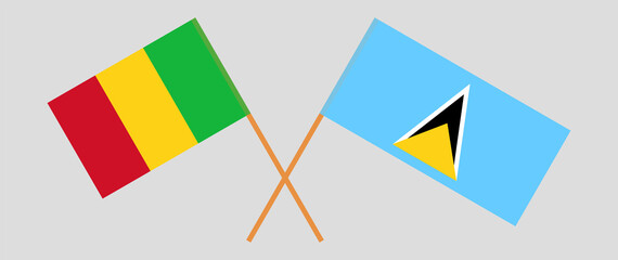 Crossed flags of Mali and Saint Lucia. Official colors. Correct proportion