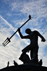neptun na tle niebia, fontanna, fontanna z neptunem, neptun na tle dramatycznego nieba, fountain with neptune against blue sky background, god of sea and oceans Neptune (Poseidon, Triton) © kateej