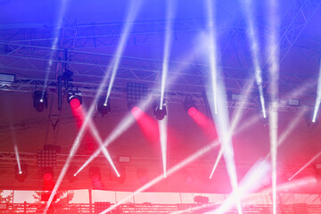 Metal trusses with colorful lights at the concert. Background with copy space for text