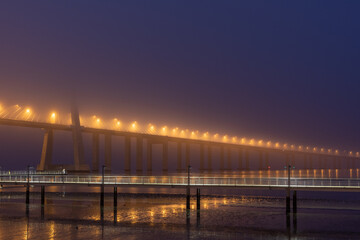 Fototapeta premium Blue hour at Ponte Vasco of Gama in Lisbon