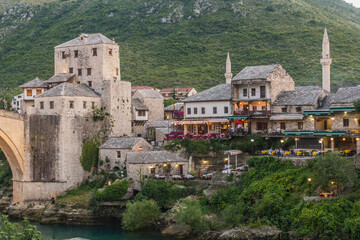 Fototapeta na wymiar MOSTAR, BOSNIA AND HERZEGOVINA - JUNE 10, 2019: Old stone buildings in Mostar. Bosnia and Herzegovina