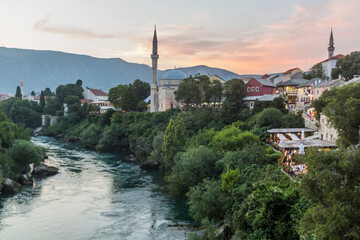 Fototapeta na wymiar Evening view of Neretva river in Mostar. Bosnia and Herzegovina