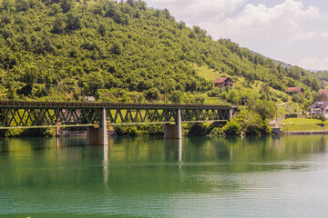Fototapeta na wymiar Railway bridge over Jablanica lake, Bosnia and Herzegovina