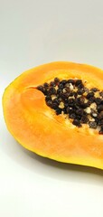 Ripe papaya fruit. Juicy and sweet papaya with seeds.