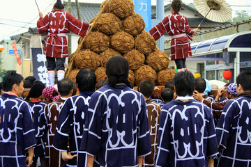 people wearing the uniforms  for a local festival in Japan