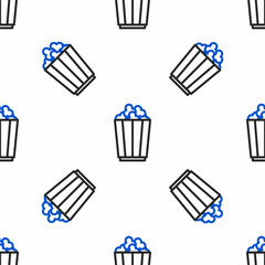 Line Popcorn in cardboard box icon isolated seamless pattern on white background. Popcorn bucket box. Colorful outline concept. Vector