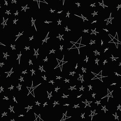 Seamless pattern with hand drawn sketch stars. Doodle illustration white stars on a black background. Vector background night sky.