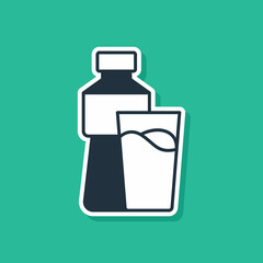 Blue Bottle of water with glass icon isolated on green background. Soda aqua drink sign. Vector