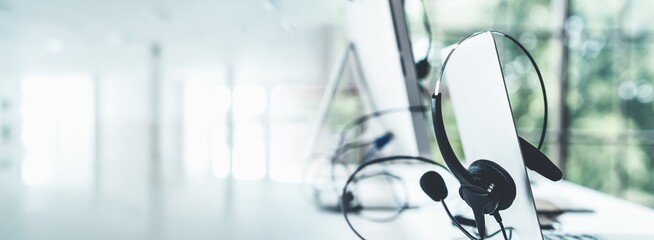 Headset and customer support equipment at call center ready for actively service . Corporate...