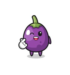 eggplant character doing Korean finger heart