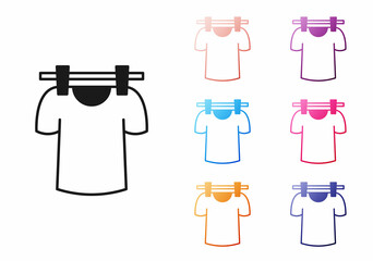 Black Drying clothes icon isolated on white background. Clean shirt. Wash clothes on a rope with clothespins. Clothing care and tidiness. Set icons colorful. Vector