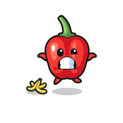 red bell pepper cartoon is slip on a banana peel