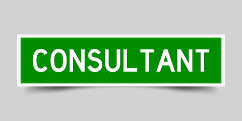 Square label sticker with word consultant in green color on gray background
