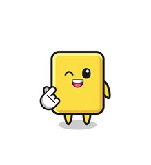yellow card character doing Korean finger heart