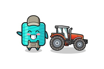 the yarn spool farmer mascot standing beside a tractor