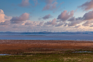 Photograph of Wind Turbines on a hill ridge line around Lake George in Australia