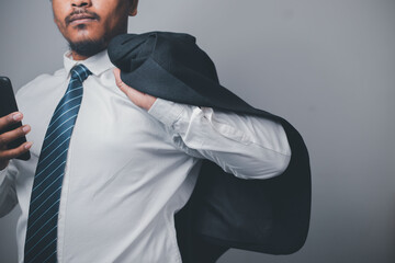 businessman wearing a suit looking professional company executive being a trendsetter courageous...