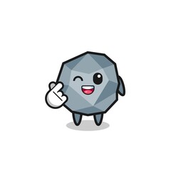 stone character doing Korean finger heart