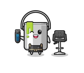 paint tin barbershop is holding a trimer