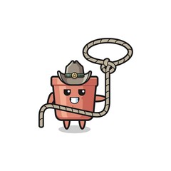 the flowerpot cowboy with lasso rope
