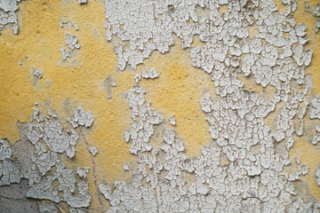old wall - background image, renovation, paint peeled off, yellow wall