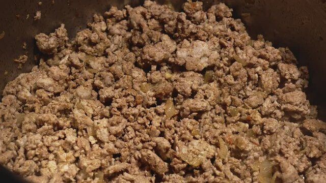 Adding Tomato Sauce to Fried Minced Meat, Making Pasta Bolognese - Steady Shot