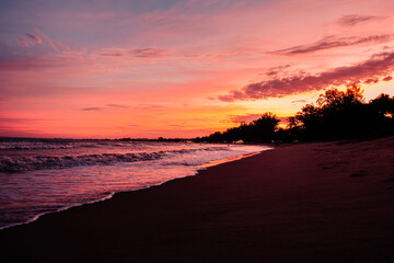 Fototapeta na wymiar Sunset over the sea and beautiful cloudscape.