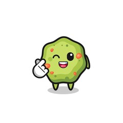 puke character doing Korean finger heart